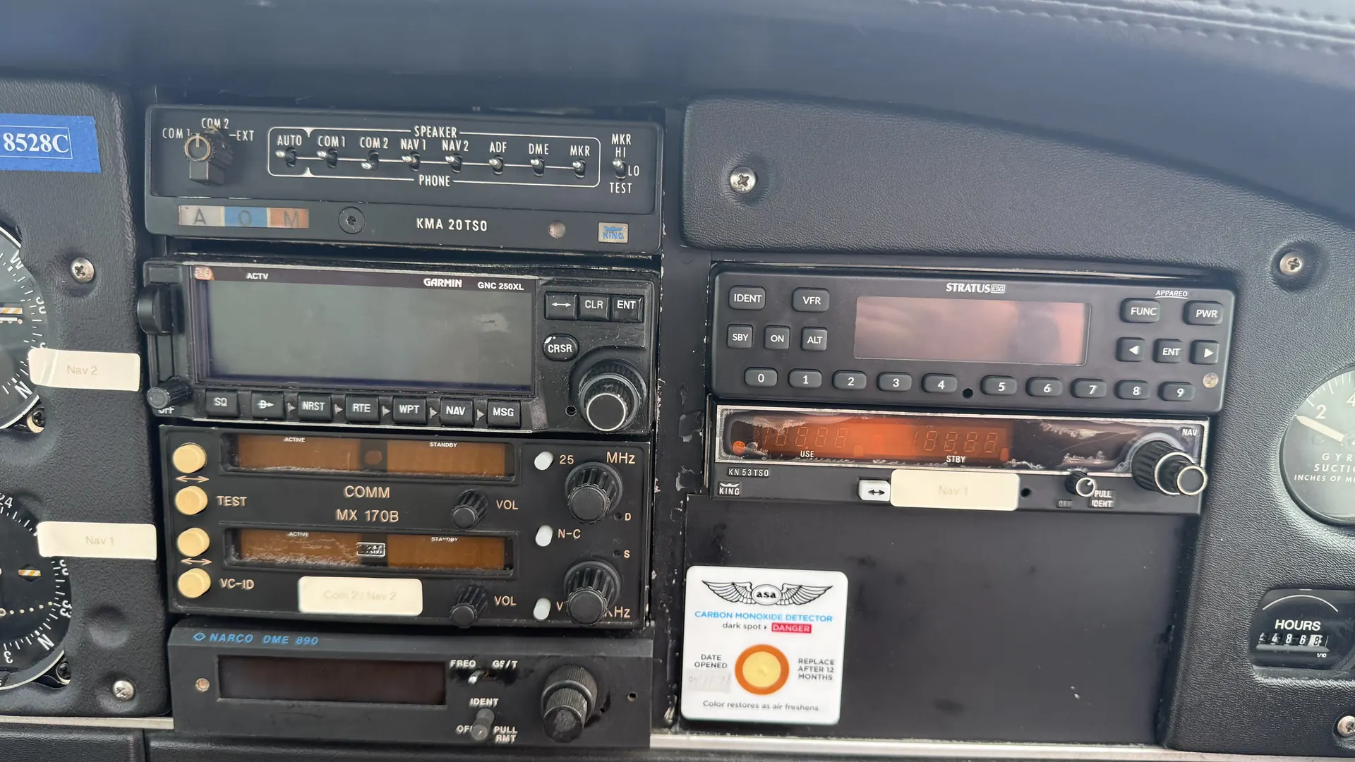 Close view of the radio stack showing the GPS, navigation radios and transponder.